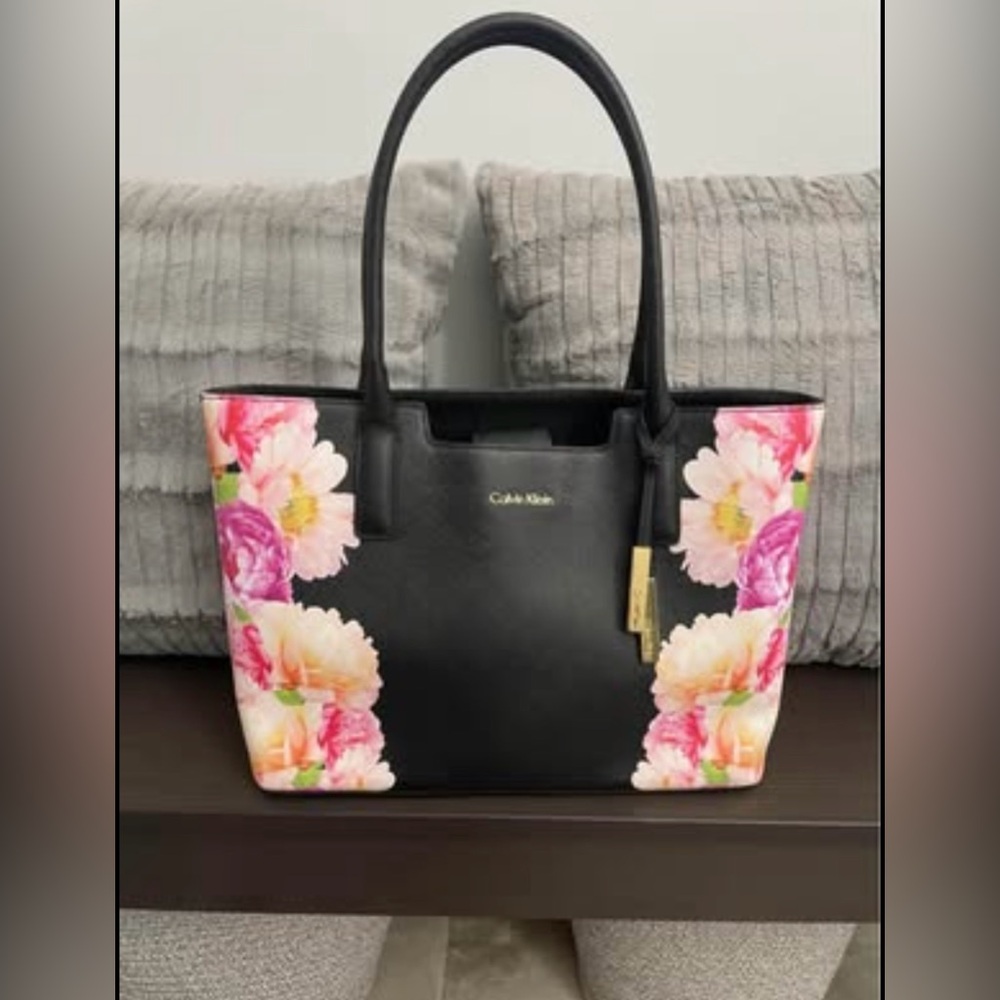 Large Calvin Klein black purse with floral pattern